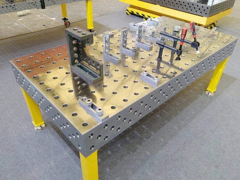 The chromeplating DCT 3D welding table features a smooth, bright surface that offers excellent corrosion resistance and easy cleaning. Ideal for light to medium-duty welding tasks, the chrome layer helps prevent weld spatter adhesion and enhances the table’s visual appeal. It’s a great choice for workshops that prioritize cleanliness, aesthetics, and efficient workflow. While not as wear-resistant as nitrided surfaces, the chromeplating modular welding table is perfect for precision welding in controlled environments where appearance and maintenance matter.